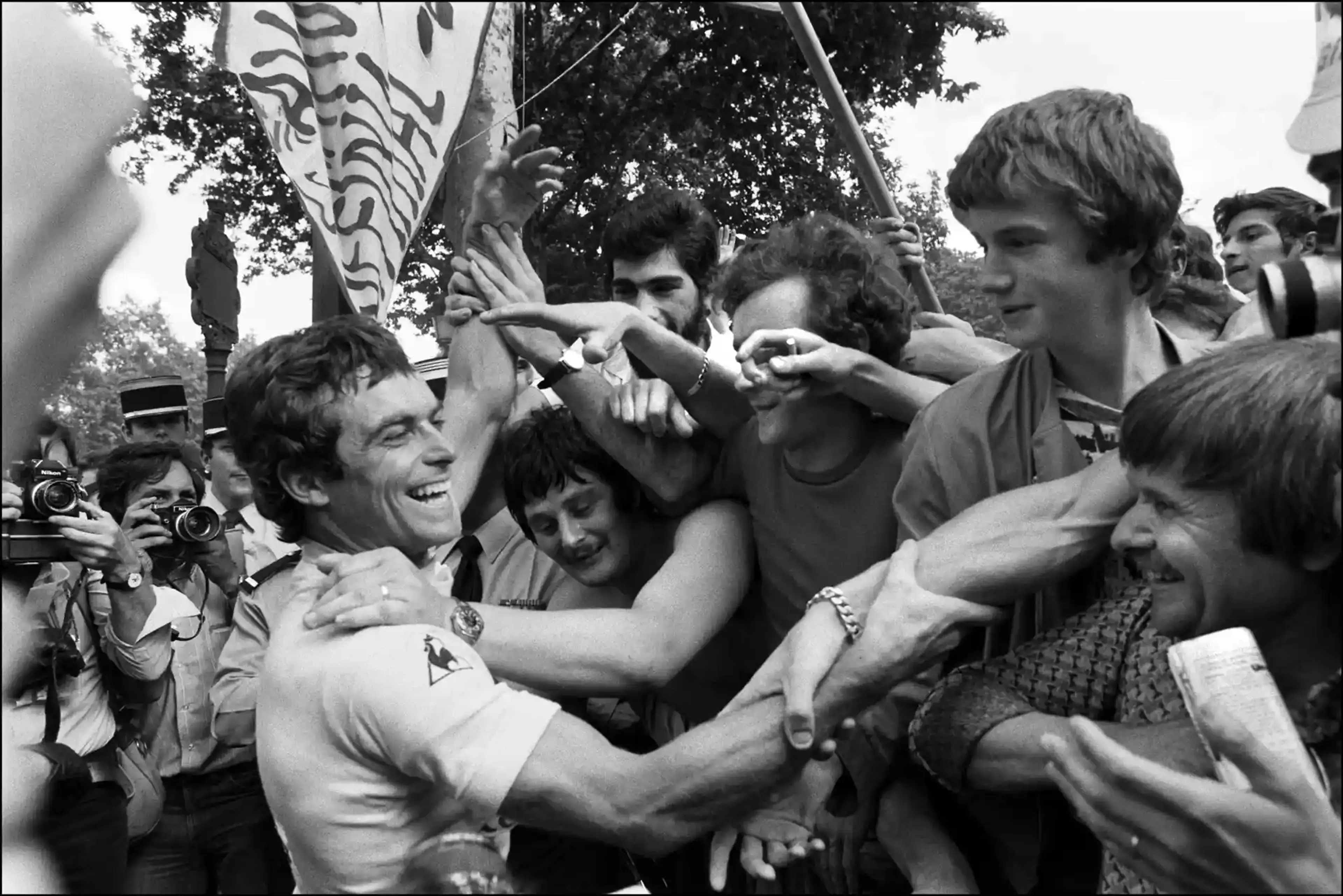 July 1978, Paris, France - Hinault celebrates with spectators after winning the 65th Tour de France